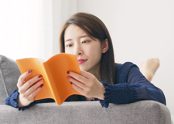 Woman reading book - prestige publishings