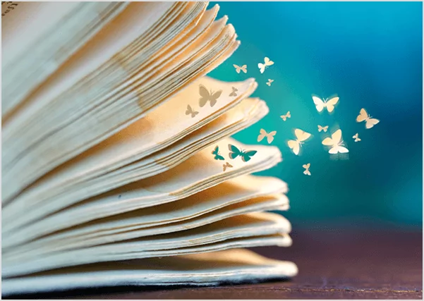 Glowing butterflies emerging from the pages of an open book, symbolizing the transformative power of creative storytelling and imaginative publishing.