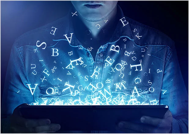 Glowing letters rising from a tablet held by a person in a denim shirt, representing modern digital publishing and e-book services.