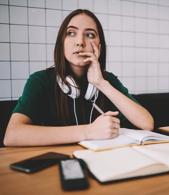 Young woman planning story writing and fiction writing for publication.