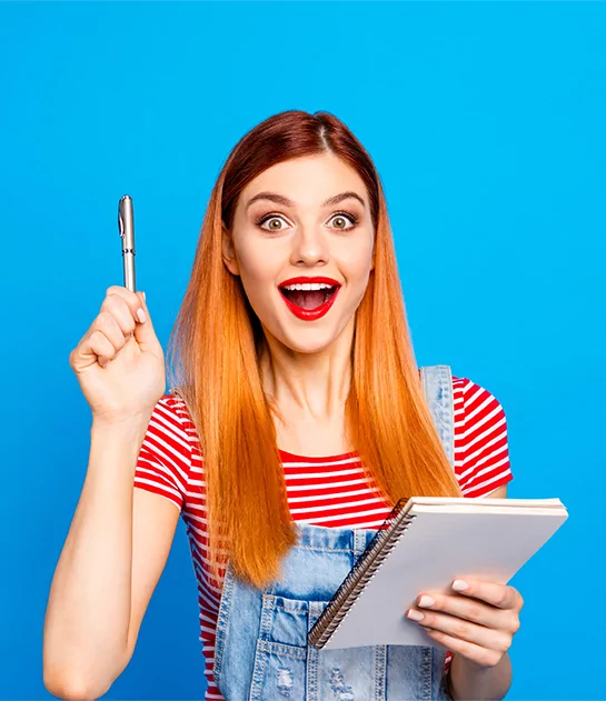 An excited woman holding a pen and notebook, symbolizing professional creative writing and publishing services.