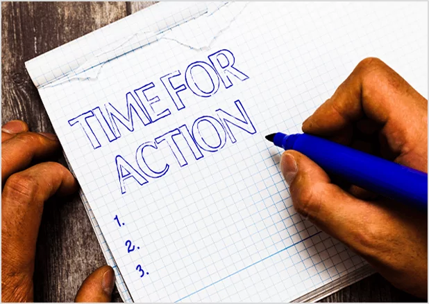 A hand writing "TIME FOR ACTION" in a notebook with a blue marker, representing proactive author consultation and publishing strategy.